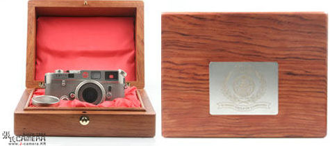 The LEICA M6 Platinum Schmidt Group 1896~1996 100 Years / Centenary Edition front view with ELMAR-M 50mm f/2.8 with Veneer wooden presentation box