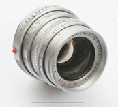 Side section and front view of a chrome finish,  Summicron-M Rooster edition 50mm f/2.0 lens 