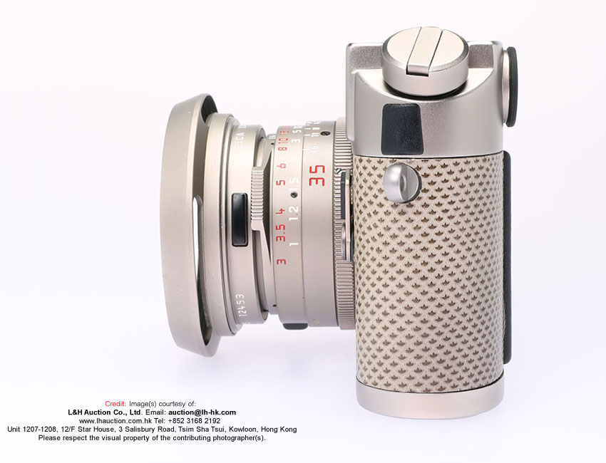 Mysterious LEICA M6 Titanium with S/N 1900000 side view with lens attached