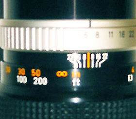 Canon 300mm f/5.6 FL-FLOURITE telephoto lens aperture and distance scales