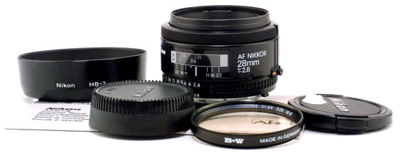 Early version of AF-Nikkor 28mm f/2.8 Ai-S wideangle lens set up with accessories