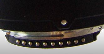 the additional AF pins  on AF-S VR 24-120mm f/3.5~5.6G AF Nikkor zoom.