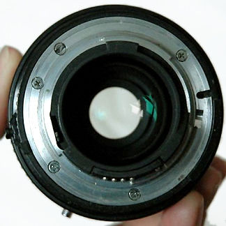 Rear lens element of Nikon's AF Zoom Nikkor 28-85mm f/3.5~4.5s MACRO wideangle-telephoto zoom lens early version