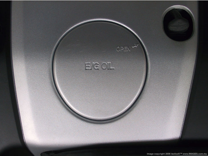 Macro shot of a car engine oil compartment