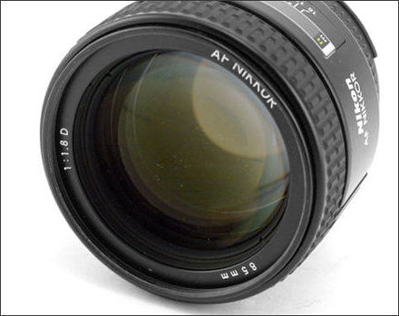 Front lens element of a Nikon autofocus AF Nikkor medium telephoto lens 85mm f/1.8D