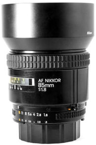 AF 85mm f/1.8 with HN-23 metal lens hood.