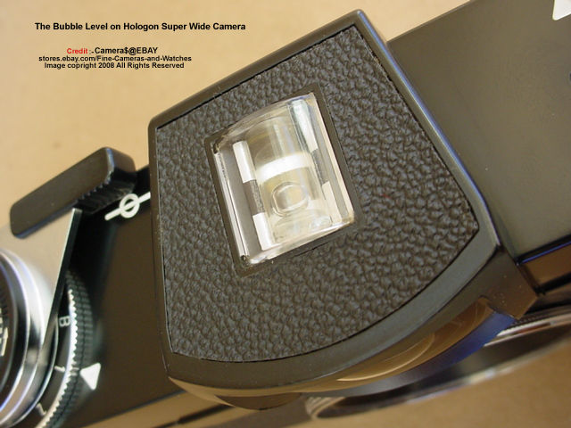 The bubble level sits on top of the optical finder of the HOLOGON ultrawide camera, 1972