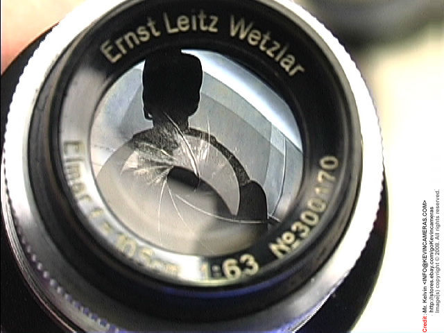 Leica Ernst Leitz Wetzlar ELMAR 105mm f/6.3 front lens element reflection view 