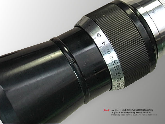 Leica ELMAR 105mm f/6.3 lens barrel section with various scales