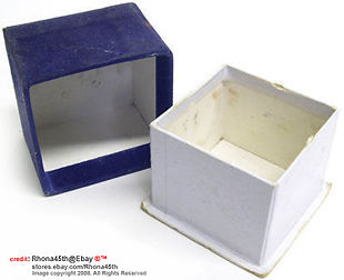 Open views of an old, Nikkor rangefinder lens box