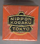An old box with Nippon Kpgaku Tokyo magazine
