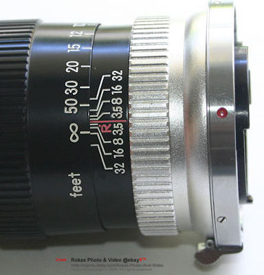 The satin chrome and brass lens mount on the Nippon Kogagu Japan Nikkor-Q.C 1:3.5 f=13.5cm new style design for Nikon rangefinder cameras 