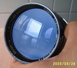 Early design of the Nikon (Nippon Kogaku K.K.) RF Nikkor-Q 1:4.0 f=25cm (250mm f/4.0) front view with exposed lens element / coating