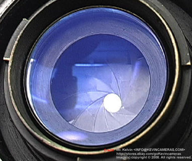 Reflective beautiful lens coating on an old, rare  Nikkor-P 1:2 f=8.5cm telephoto lens for Nikon rangefinder cameras