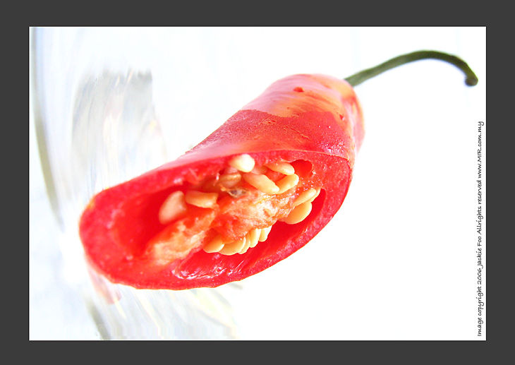Chilli on the table ... by Jackie Foo