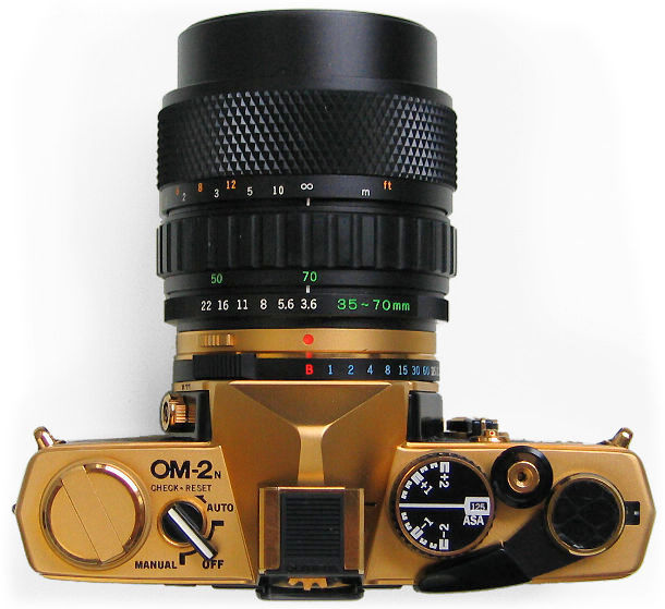 Gold_OM2n_Top1.JPG (73k) Loading .........