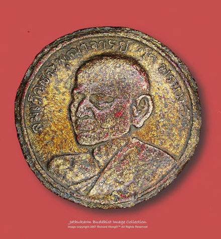 an aged, original early version of Jatukarm / Jathukarm /Jathukam Image rear section view with monk image